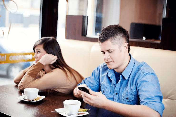 Signs he's talking to someone else through text 